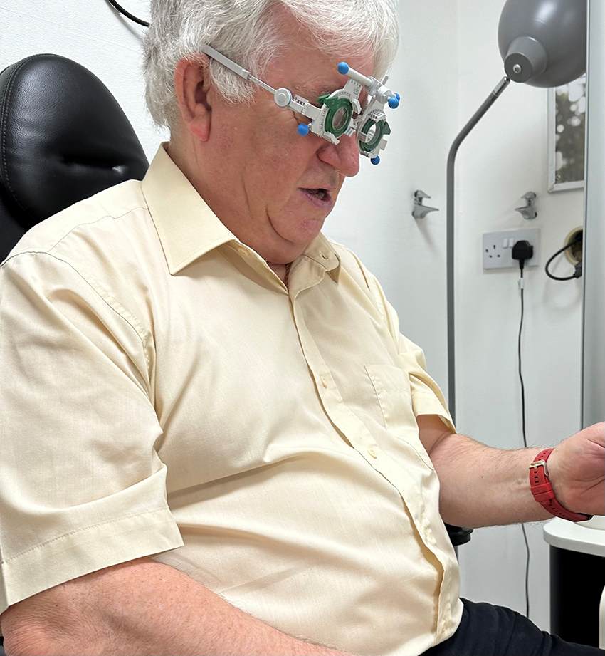 One Optics optician carrying out an eye examination
